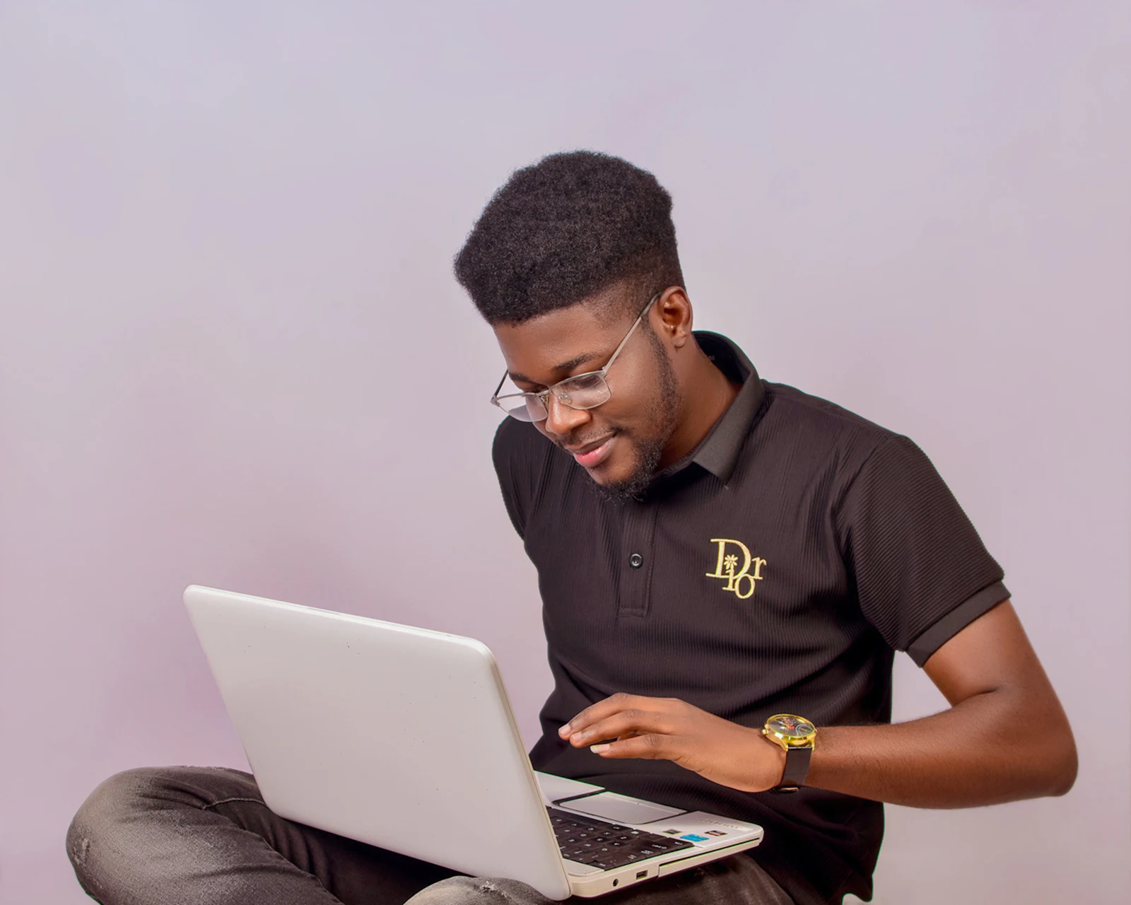 An Elnux engineer working on a laptop